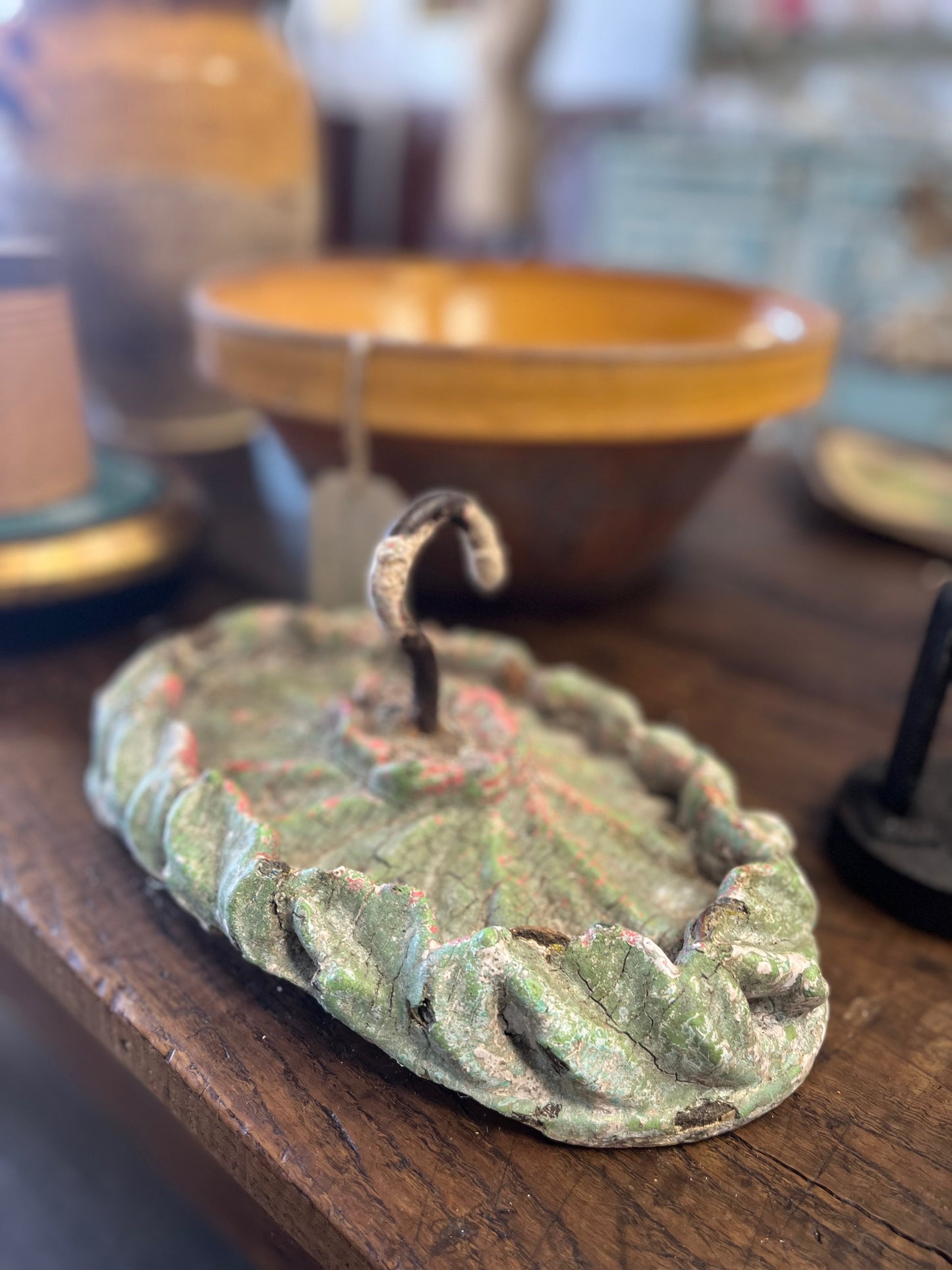 Hand carved oval wall or ceiling hook