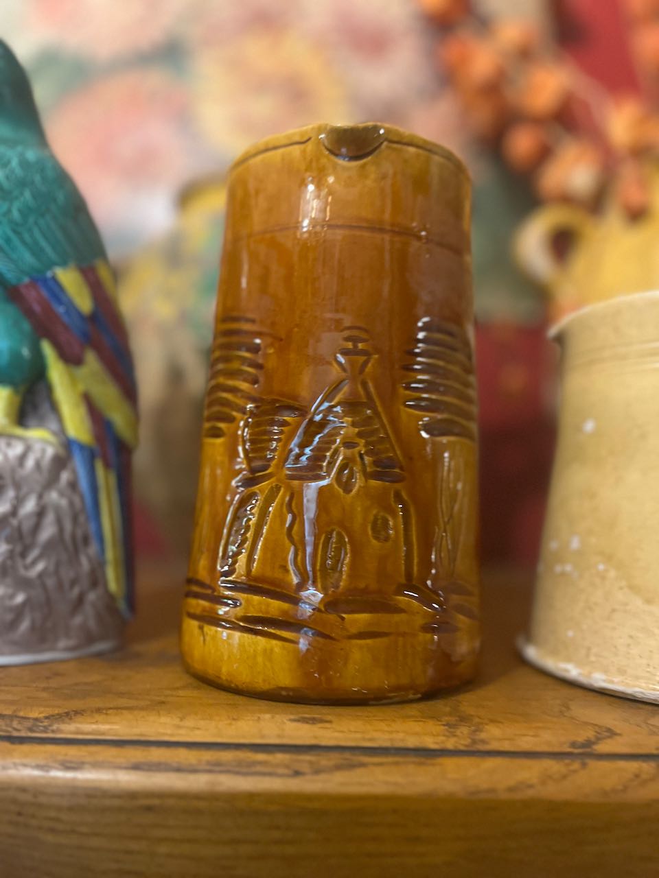 fa729 Treacly coloured jug with cottage scene