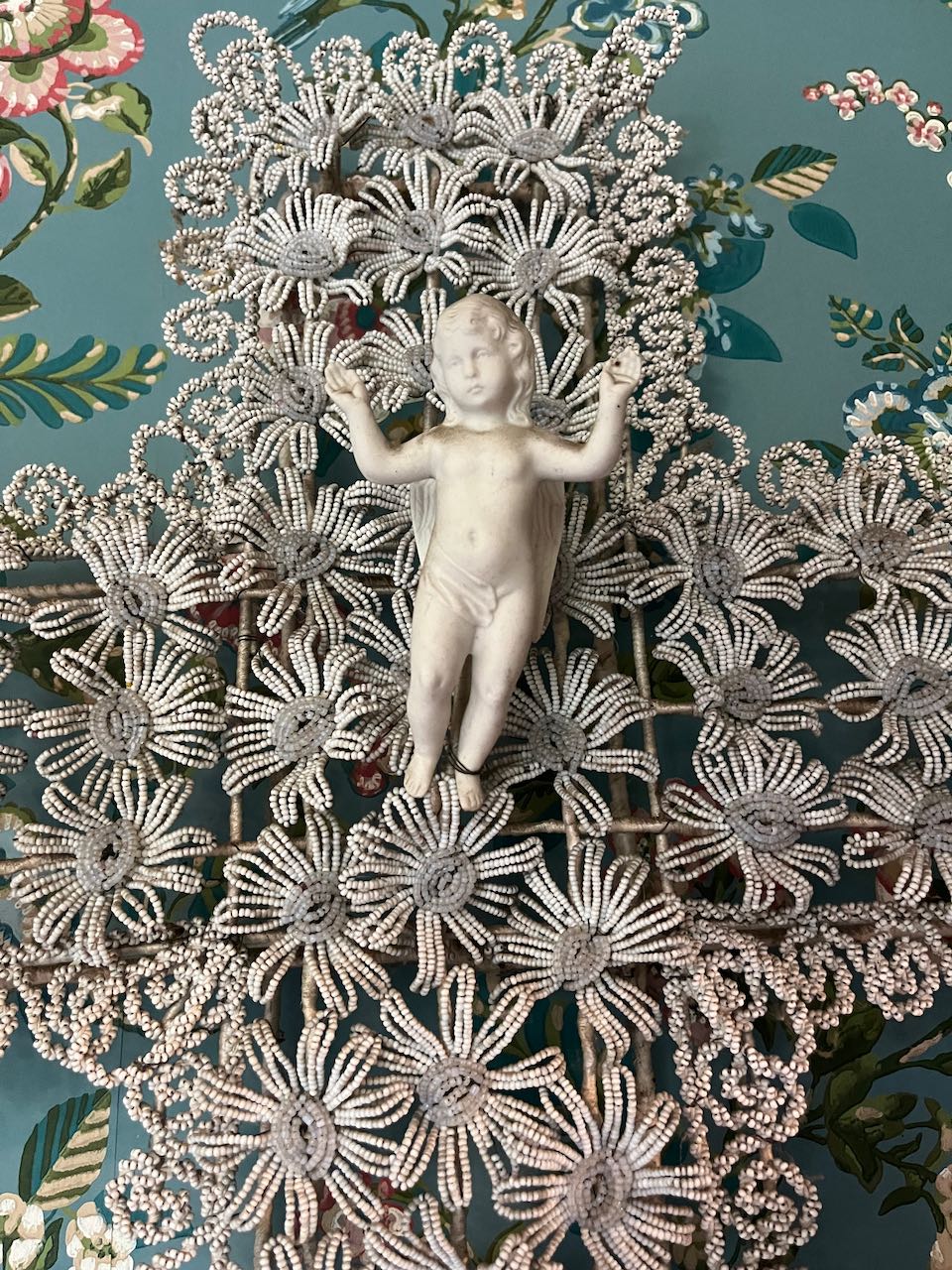 fa873 French antique glass hand beaded cross with a little porcelain angel in the middle