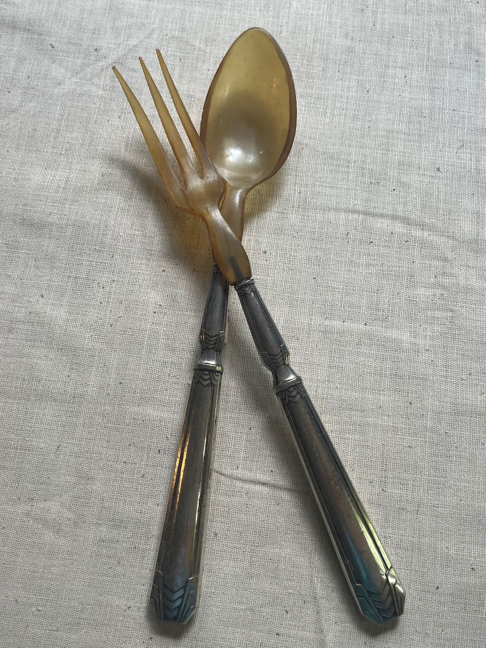 fa891 Pair of silver plated and resin salad servers 1920's