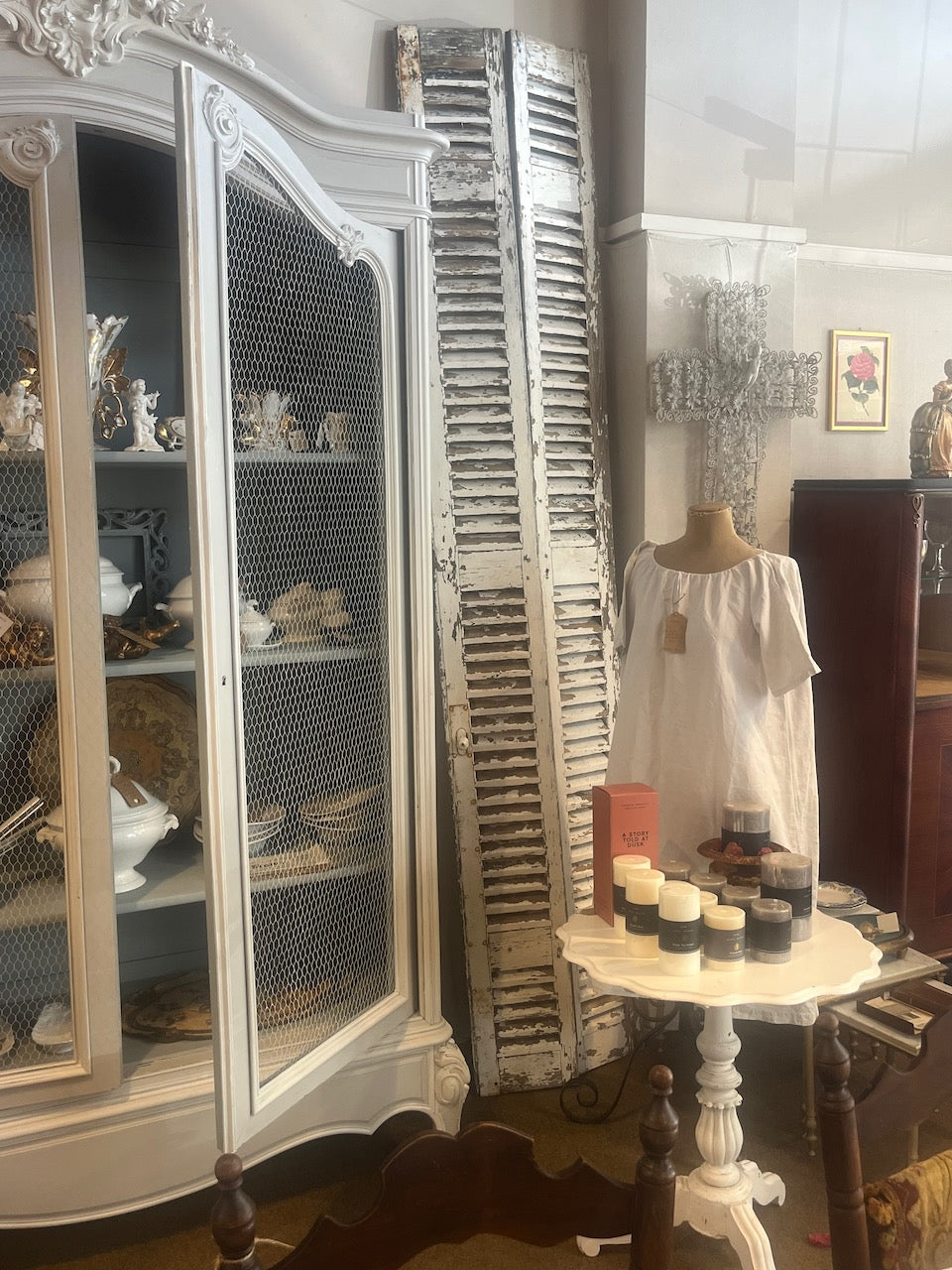 a tall pair of French antique shutters