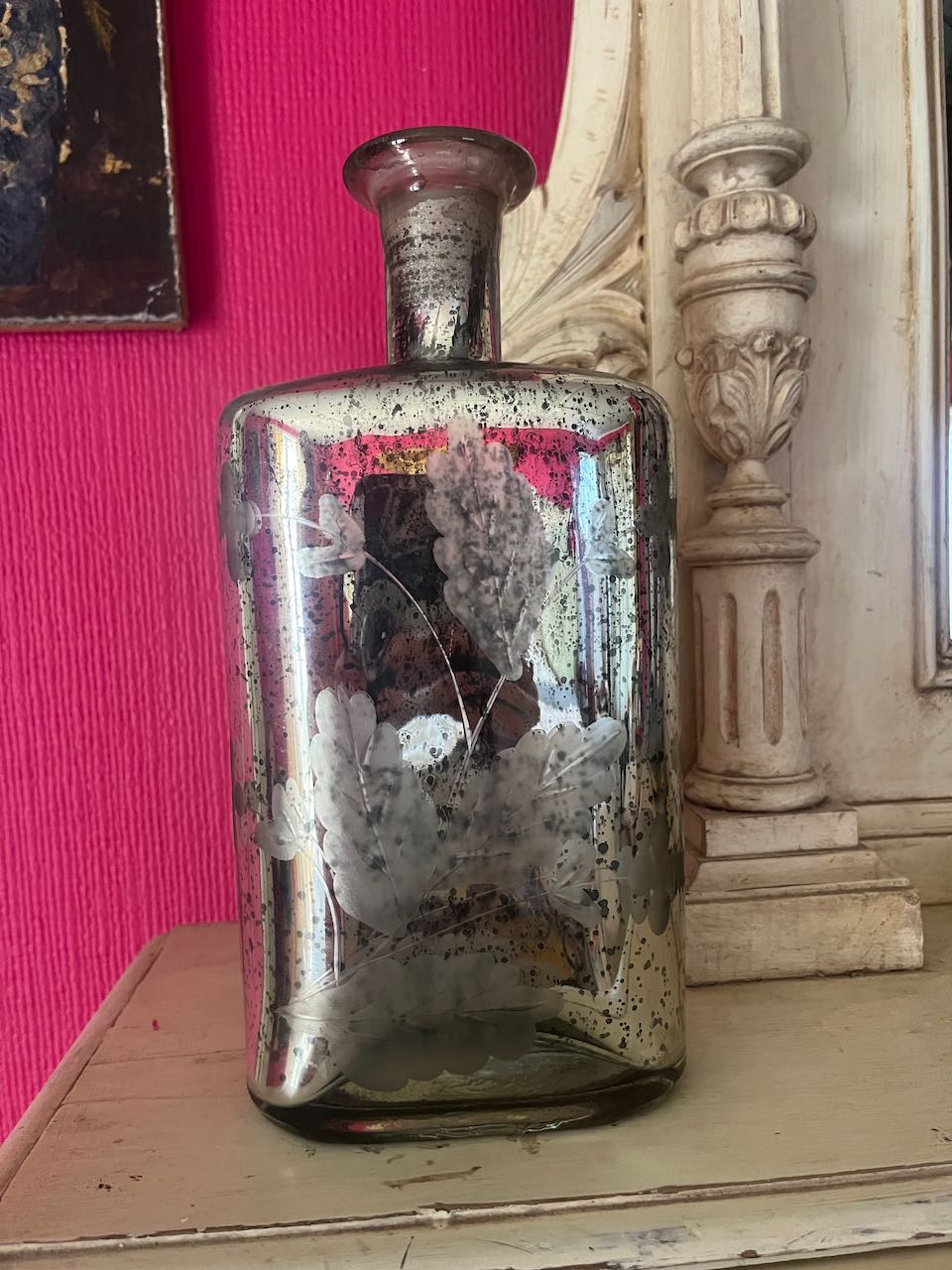 Vintage silver mercury glass bottle with etched floral pattern, 