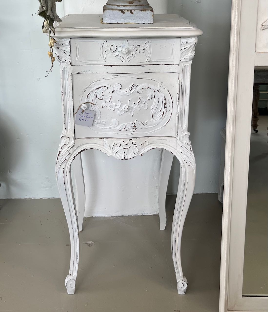 French antique Bedside with carved front.