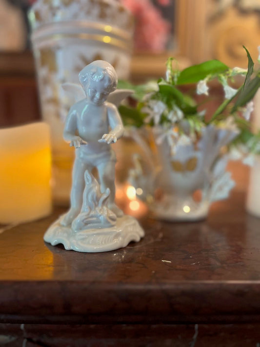 fa622 Small porcelain Dresden Cherub by the fire