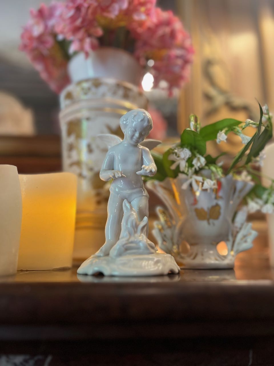 fa622 Small porcelain Dresden Cherub by the fire