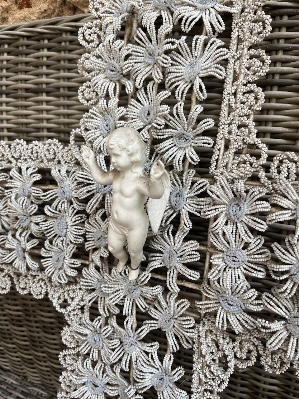 fa873   French antique glass hand beaded cross with a little porcelain angel in the middle