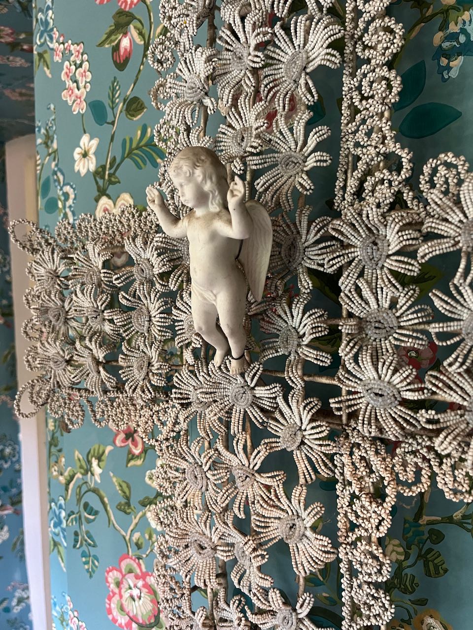 fa873   French antique glass hand beaded cross with a little porcelain angel in the middle