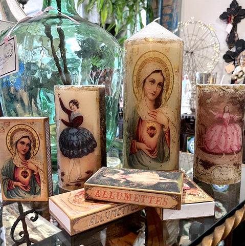 tfa10 large candle with images of religious figures and gold foil